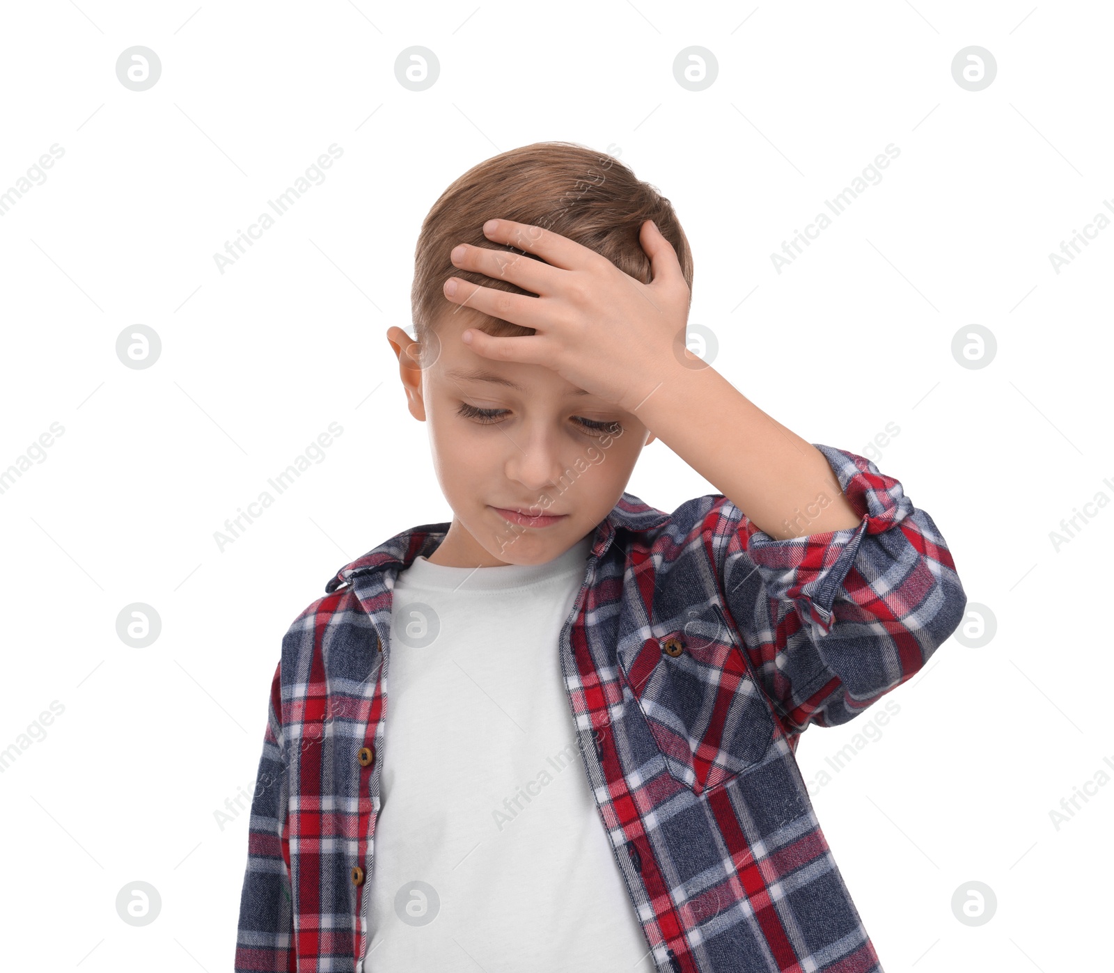 Photo of Little boy suffering from headache on white background