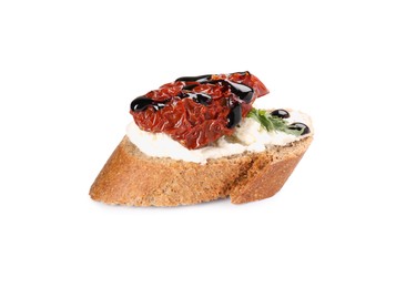 Photo of Delicious bruschetta with sun-dried tomato, cream cheese and balsamic vinegar isolated on white
