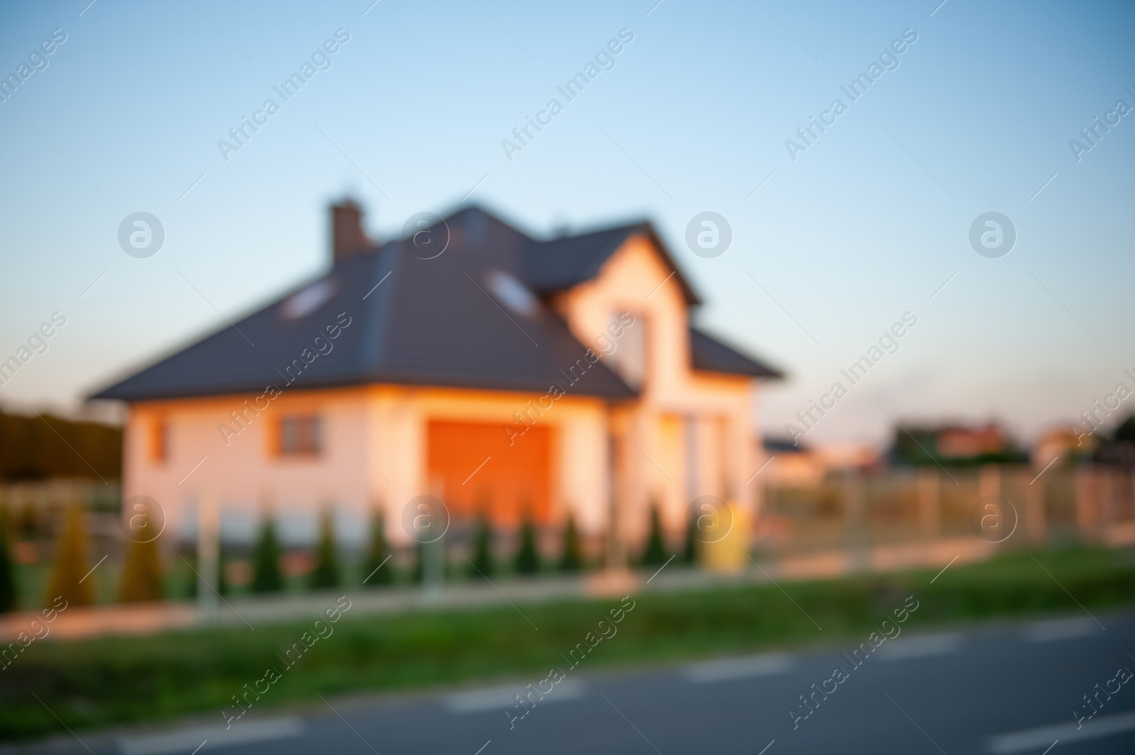 Photo of Blurred view of beautiful house in evening