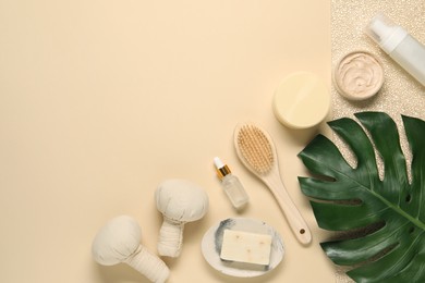 Bath accessories. Flat lay composition with personal care products on beige background, space for text