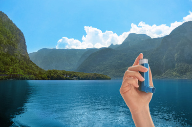 Image of Woman with asthma inhaler and beautiful mountain river on background, closeup. First emergency medical aid