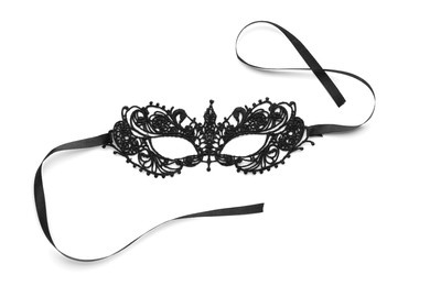 Photo of Black lace mask on white background, top view. Accessory for sexual roleplay