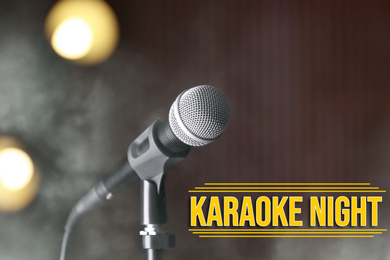 Modern microphone and text KARAOKE NIGHT on dark background