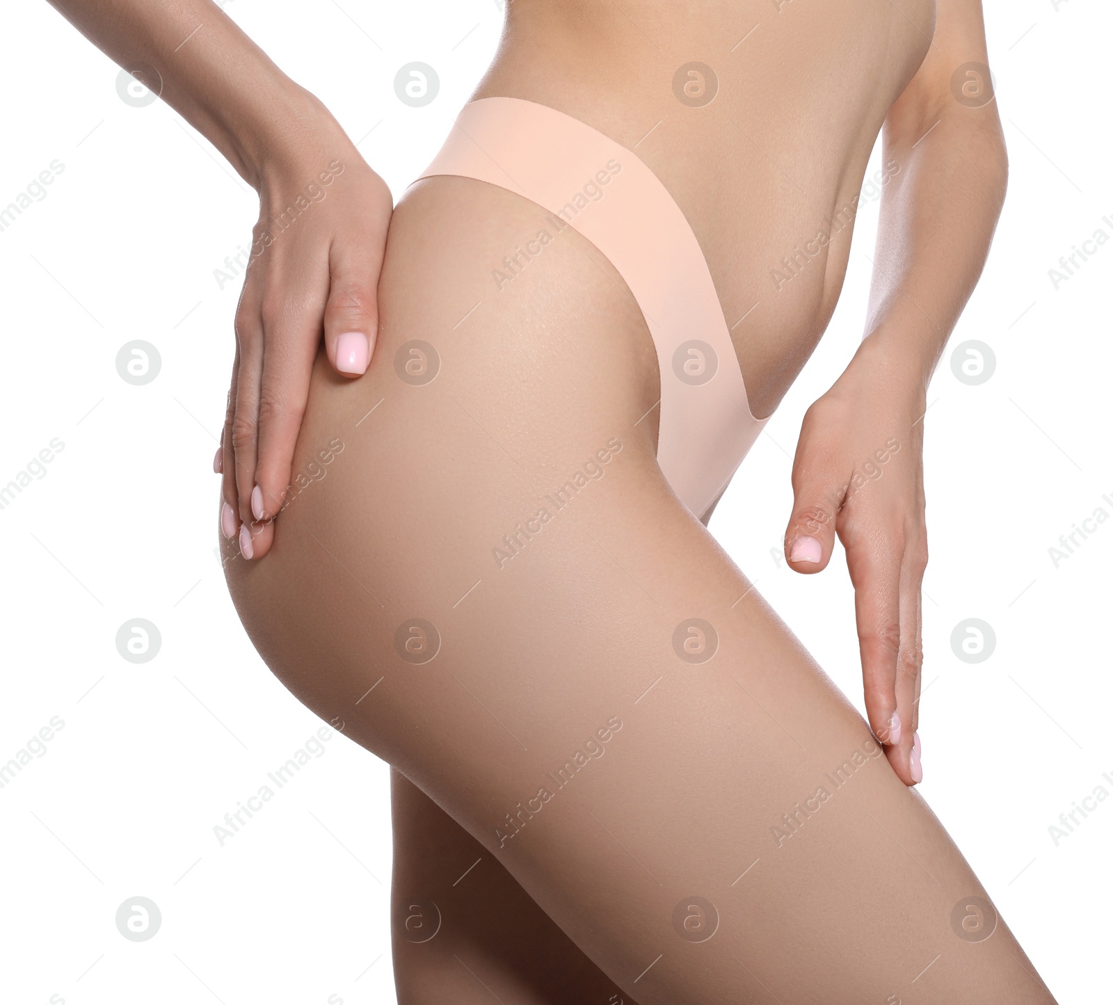 Photo of Closeup view of slim woman in underwear on white background. Cellulite problem concept