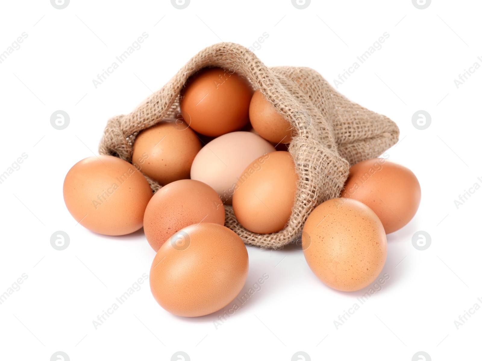 Photo of Fresh chicken eggs in burlap sack isolated on white