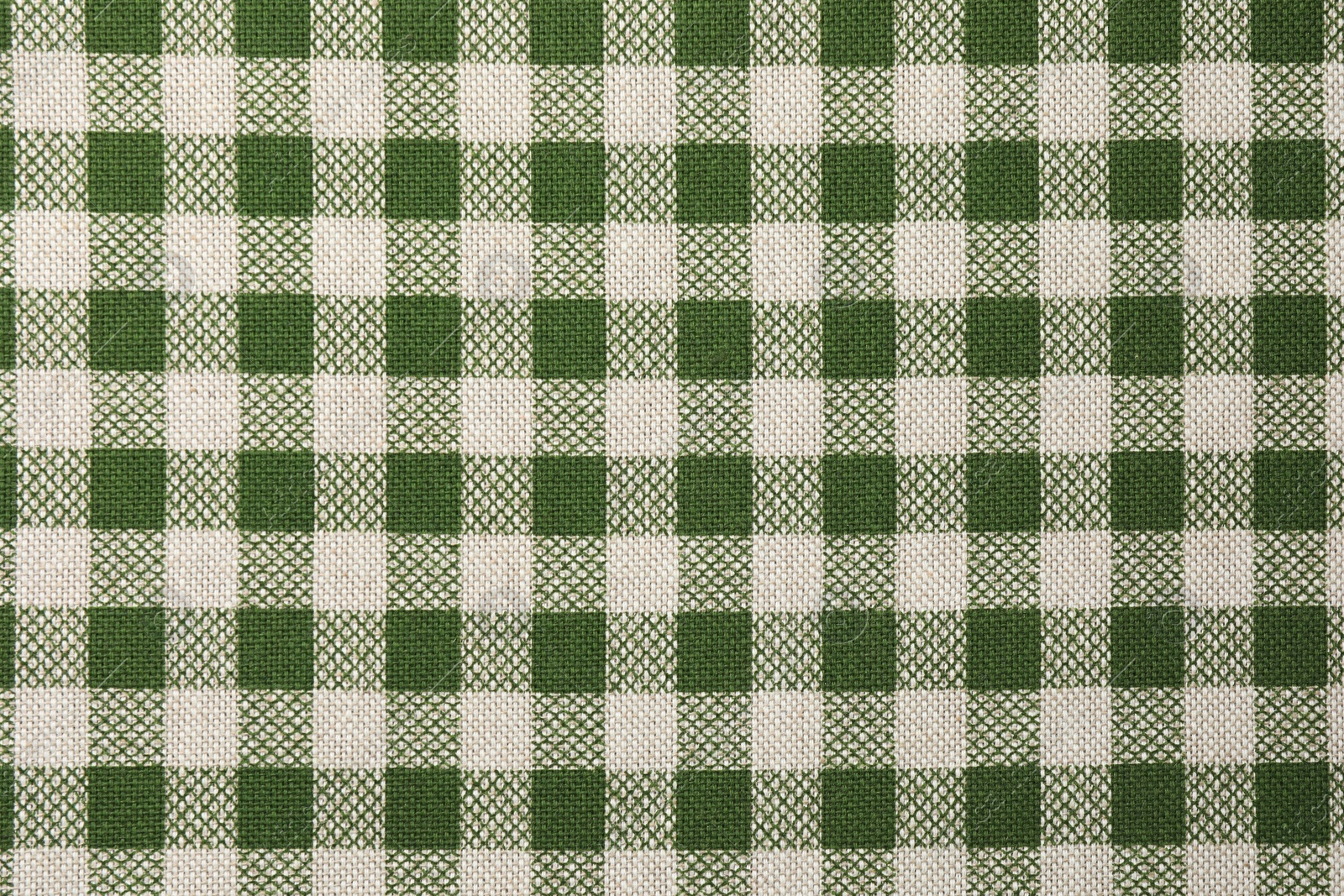 Photo of Texture of checkered fabric as background, top view