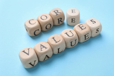 Beads with phrase CORE VALUES on light blue background