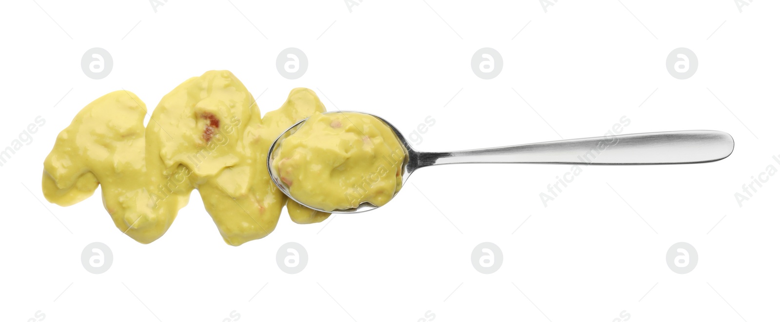 Photo of Delicious guacamole sauce and spoon isolated on white, top view