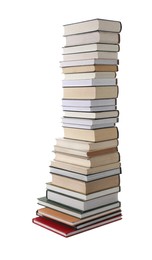 High stack of many different books isolated on white