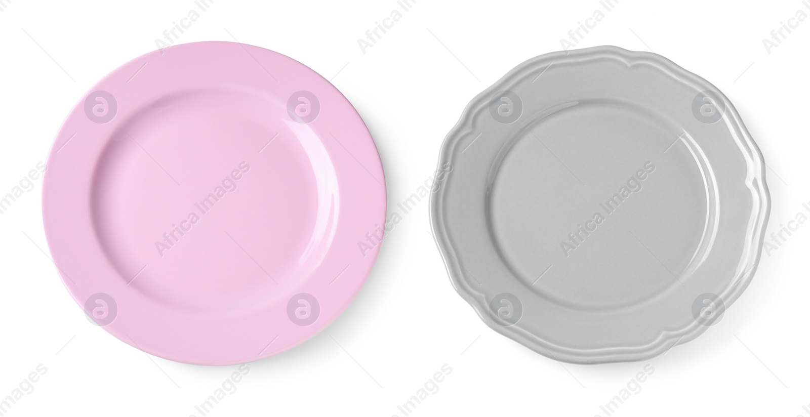 Image of Different ceramic plates on white background, top view