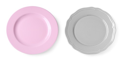 Image of Different ceramic plates on white background, top view