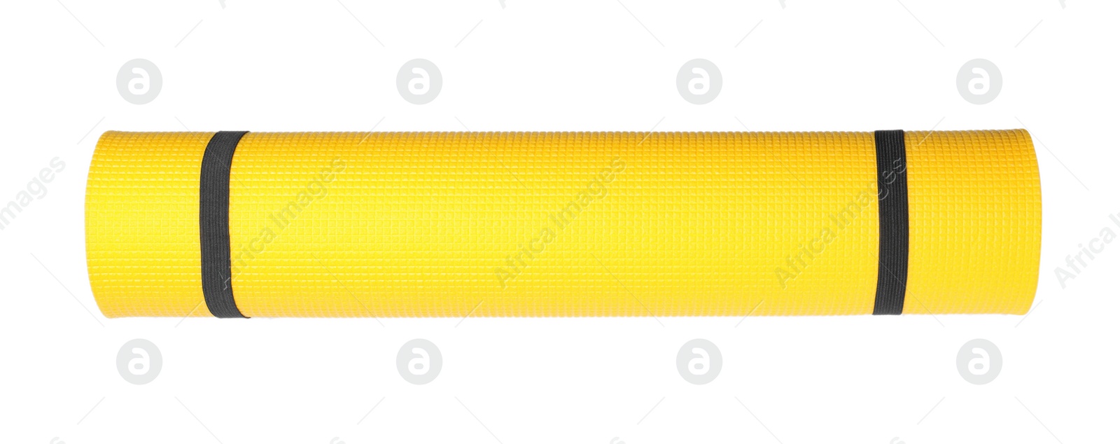 Photo of Yellow rolled camping or exercise mat on white background, top view