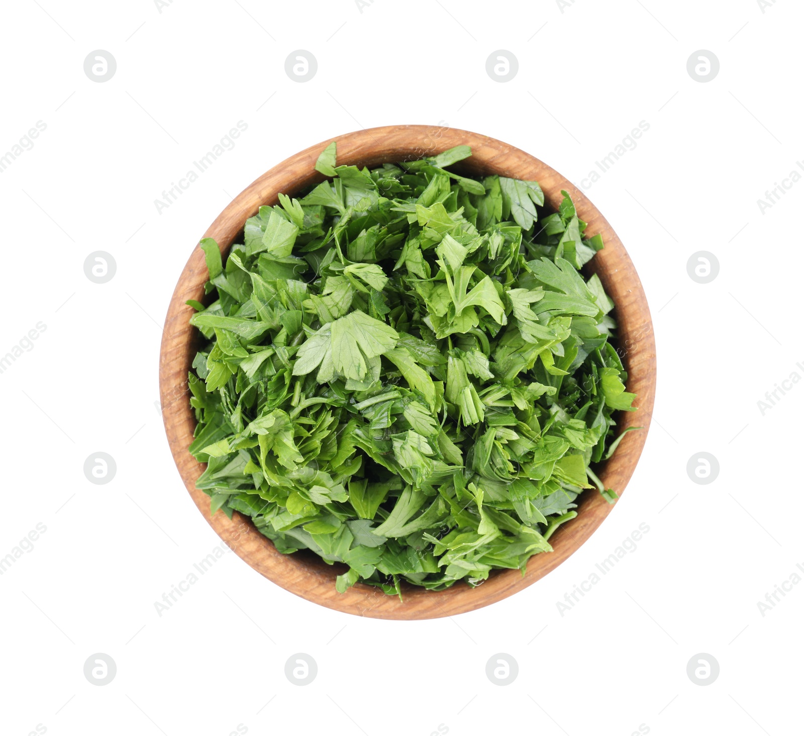 Chopped parsley leaves in wooden bowl isolated on white, top view Photo of Chopped parsley leaves in wooden bowl isolated on white, top view