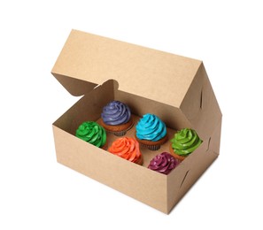Photo of Box with different cupcakes on white background