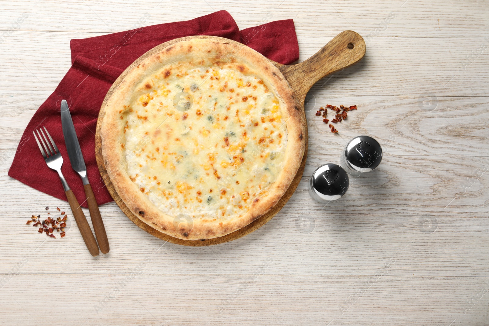 Photo of Delicious cheese pizza served on white wooden table, flat lay. Space for text