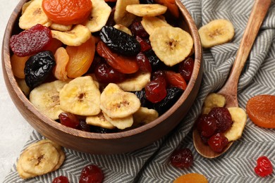 Mix of delicious dried fruits on table, above view