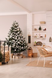 Cozy dining room interior with Christmas tree and festive decor