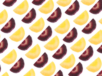 Image of Yellow and purple carrot slices flying on white background. Pattern design