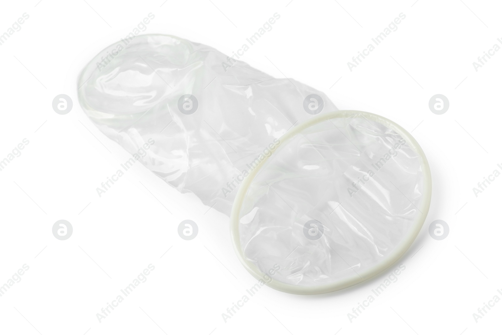 Photo of Unrolled female condom isolated on white. Safe sex