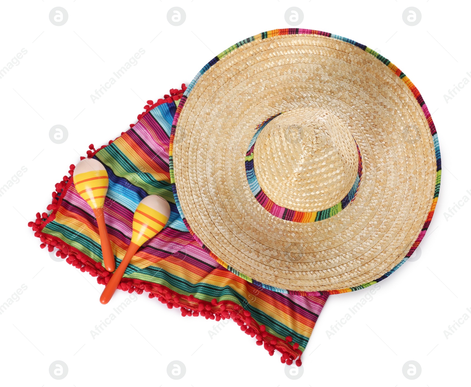 Photo of Mexican sombrero hat, maracas and colorful poncho isolated on white, top view