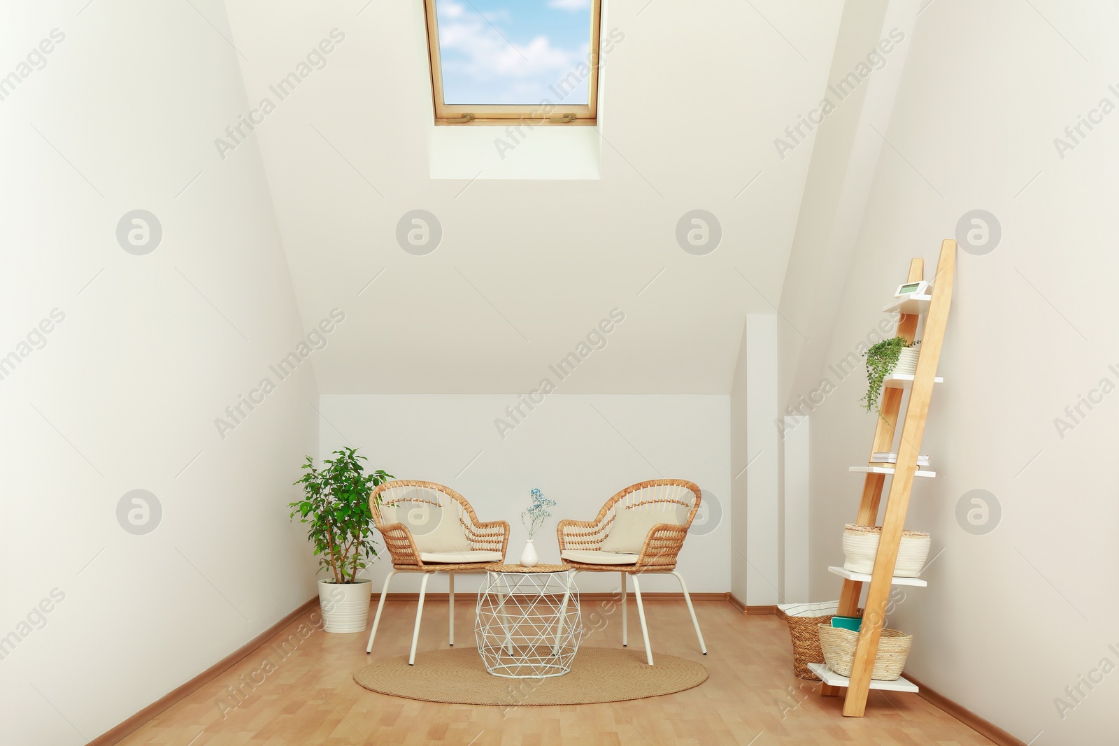 Photo of Attic room with stylish wooden furniture. Interior design