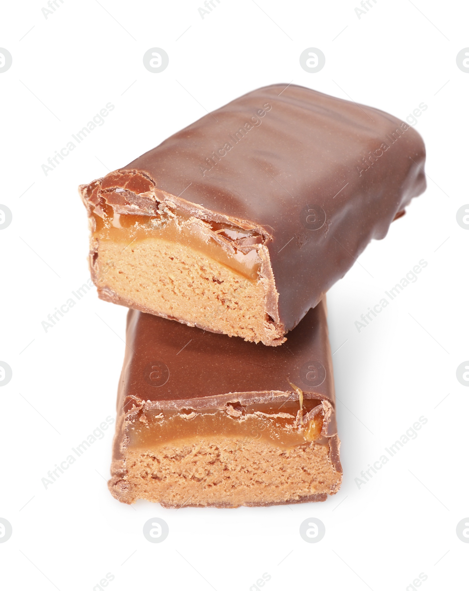 Photo of Pieces of tasty chocolate bars with nougat on white background