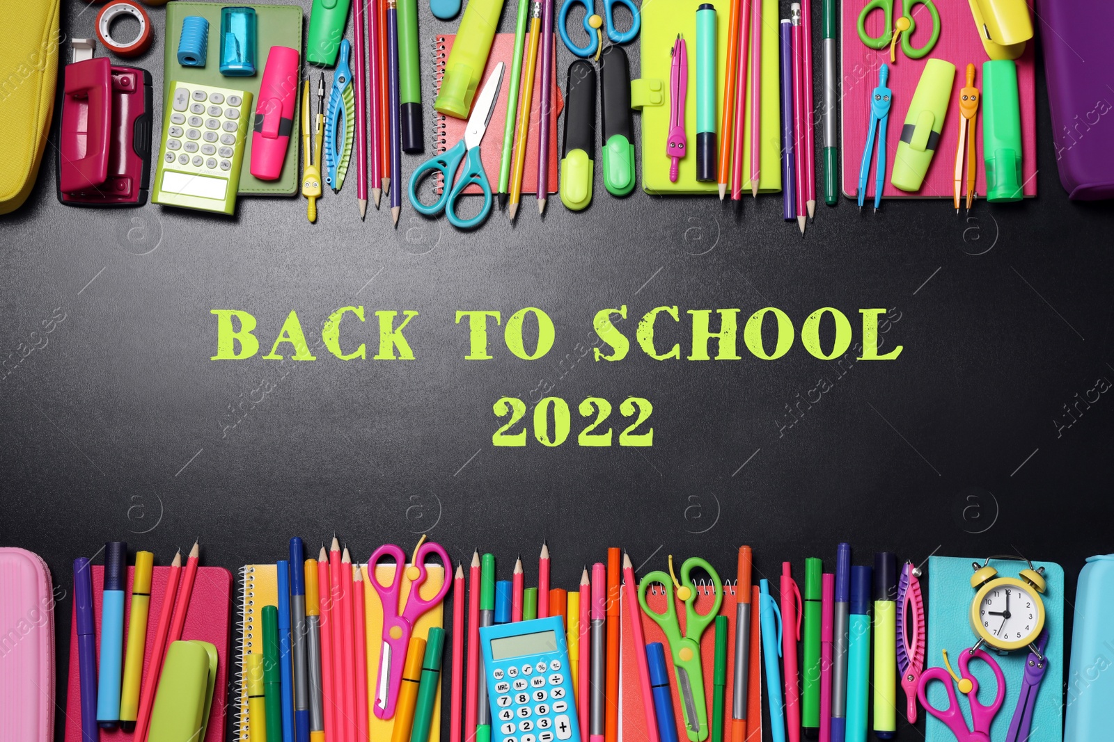 Image of Back to school 2022. Flat lay composition with different stationery on blackboard