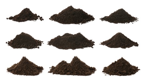 Set with piles of fertile soil on white background