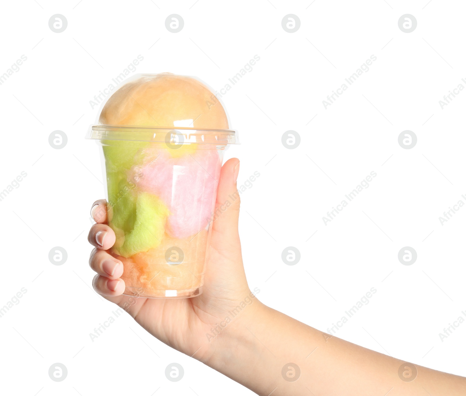 Photo of Young woman holding plastic cup with cotton candy on white background, closeup