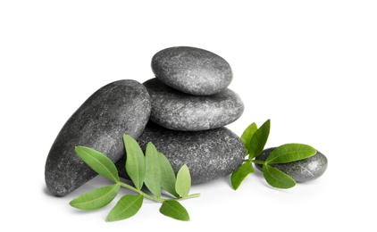 Photo of Composition with spa stones on white background