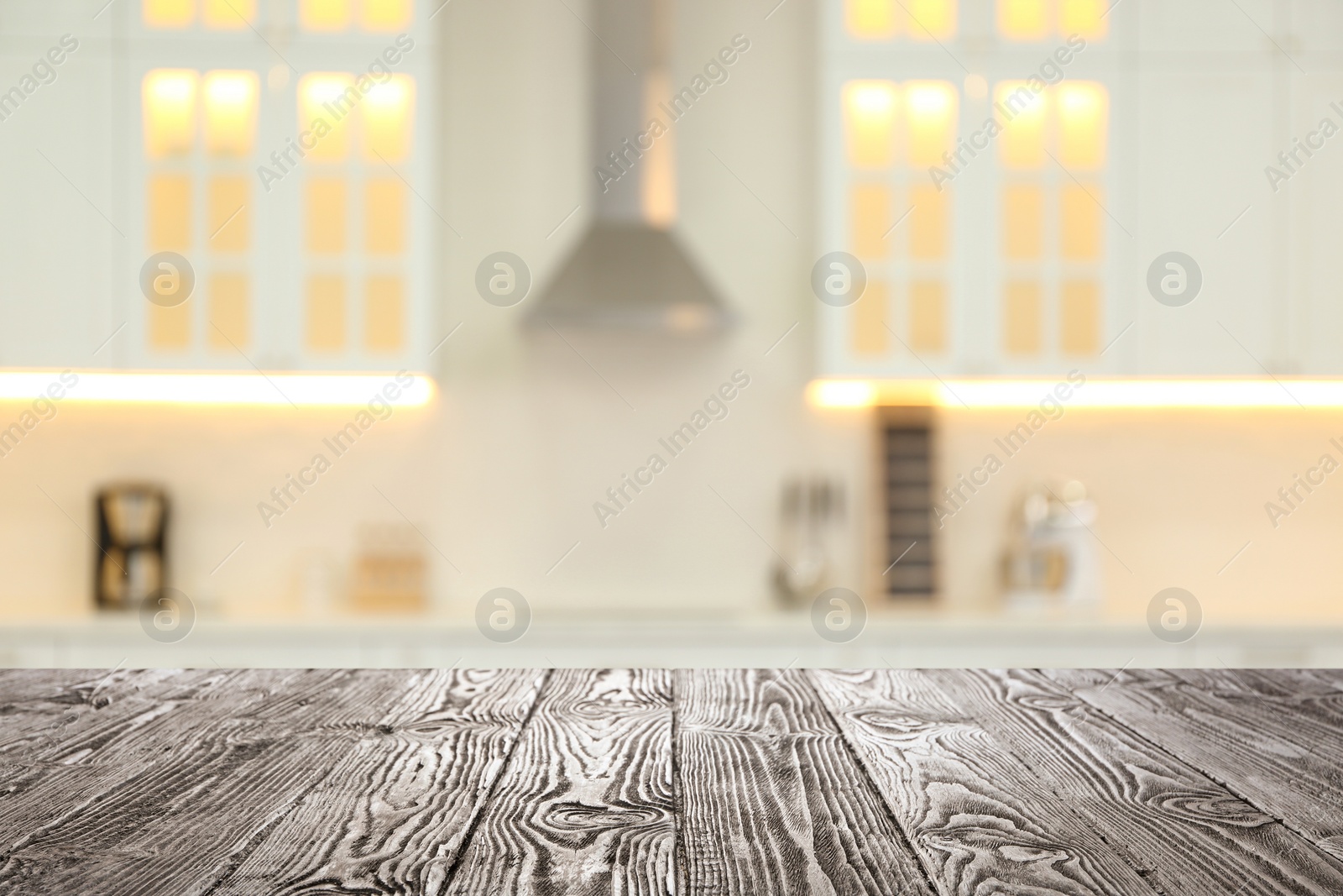 Image of Empty wooden table and blurred view of stylish kitchen interior. Mockup for design