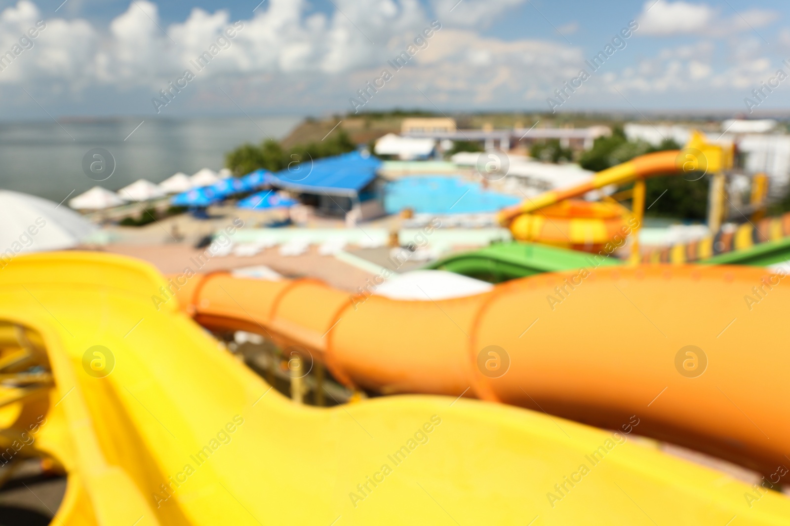 Photo of Blurred view from colorful slides in water park