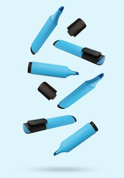 Image of Many cyan markers falling on light background