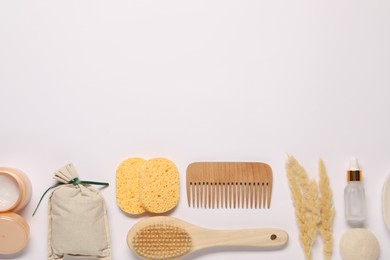 Photo of Bath accessories. Different personal care products and dry spikelets on white background, flat lay with space for text