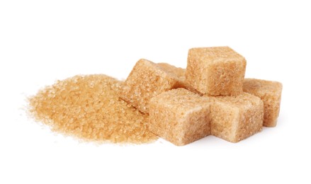 Photo of Granulated and cubed brown sugar on white background