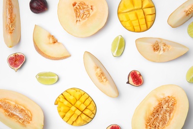 Photo of Flat lay composition with melon and other fruits on white background