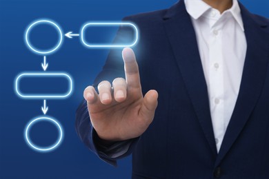 Image of Man pointing at flowchart on virtual screen against blue background, closeup. Business process