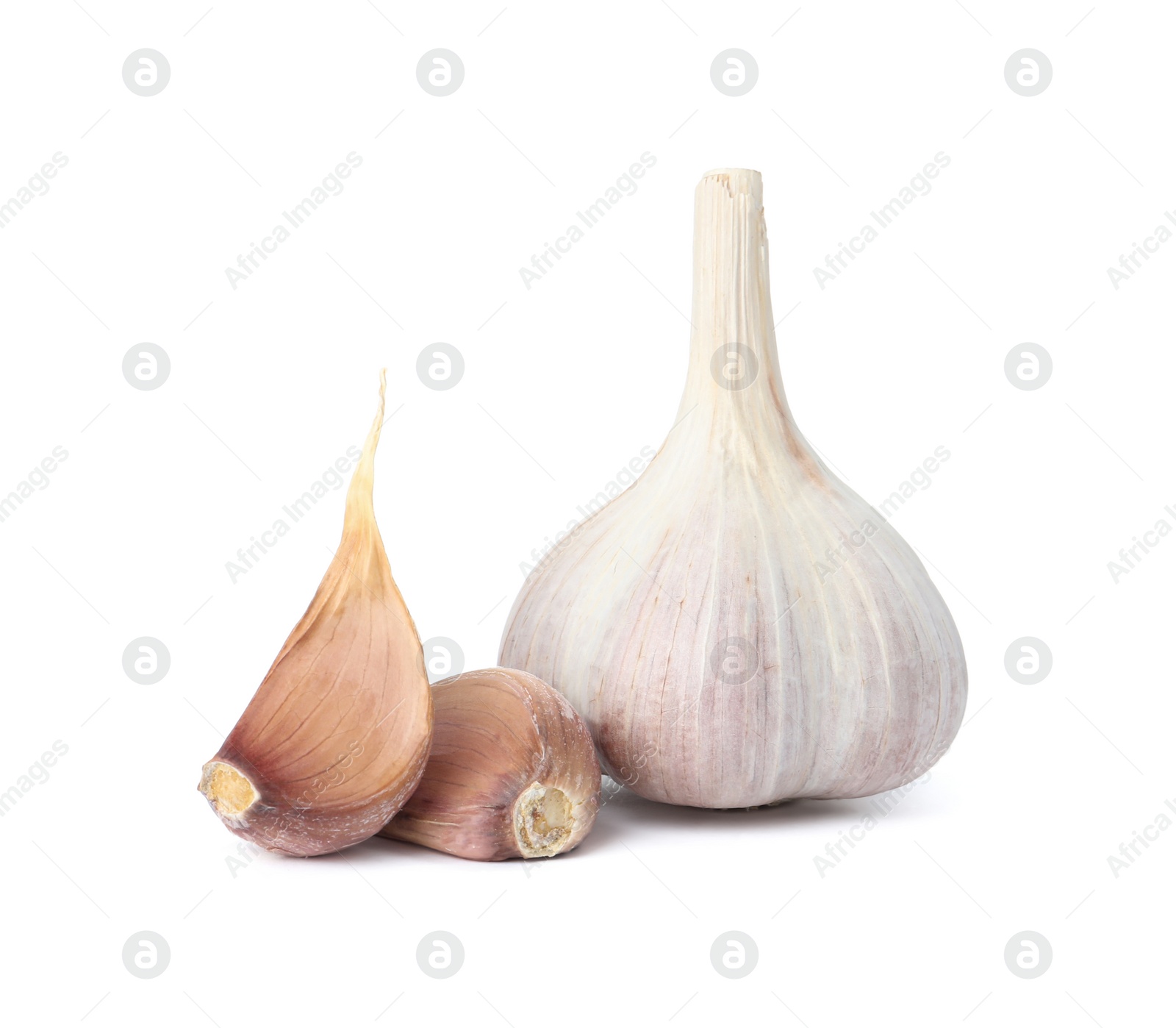 Photo of Fresh organic garlic bulb and cloves on white background