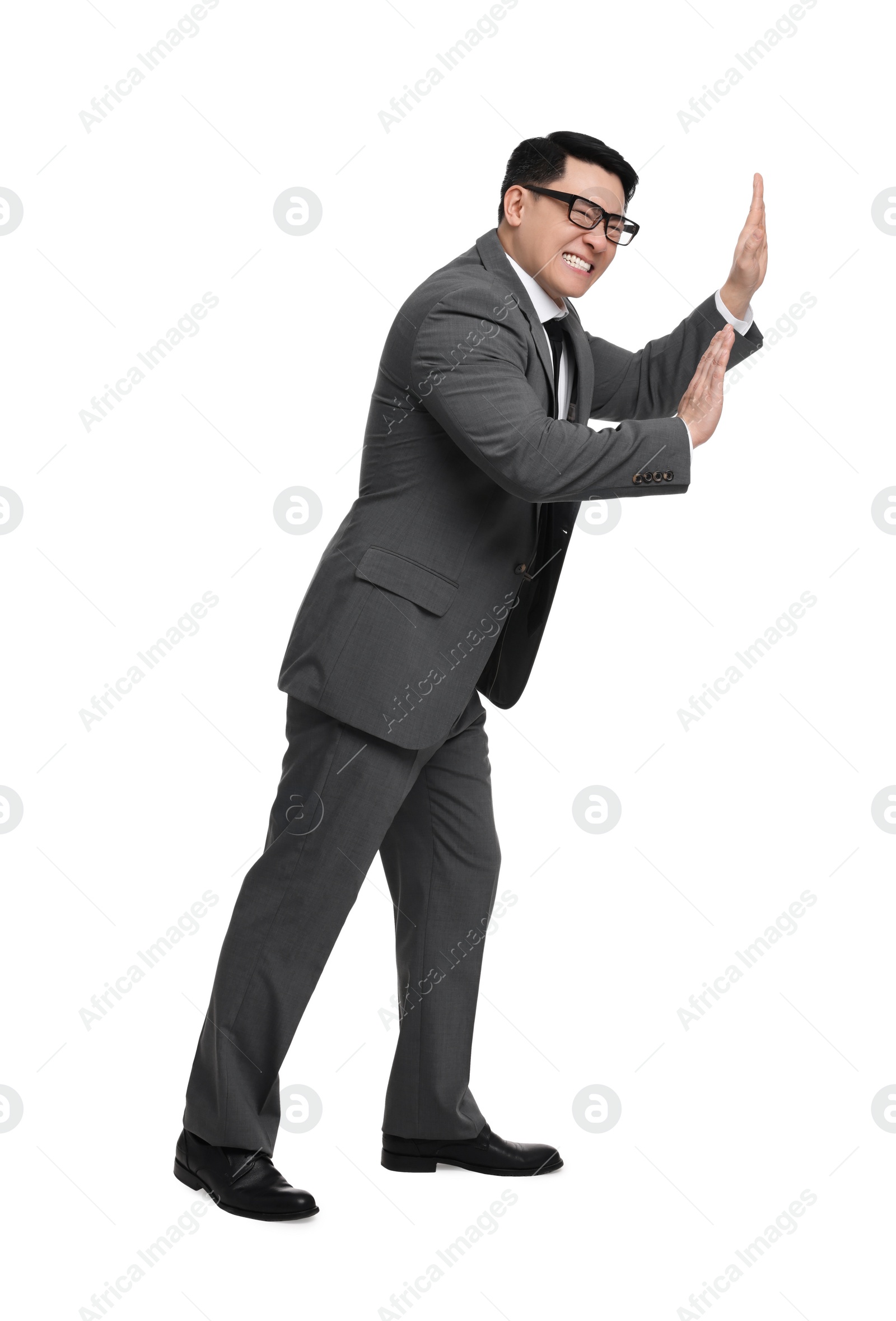 Photo of Businessman in suit posing on white background