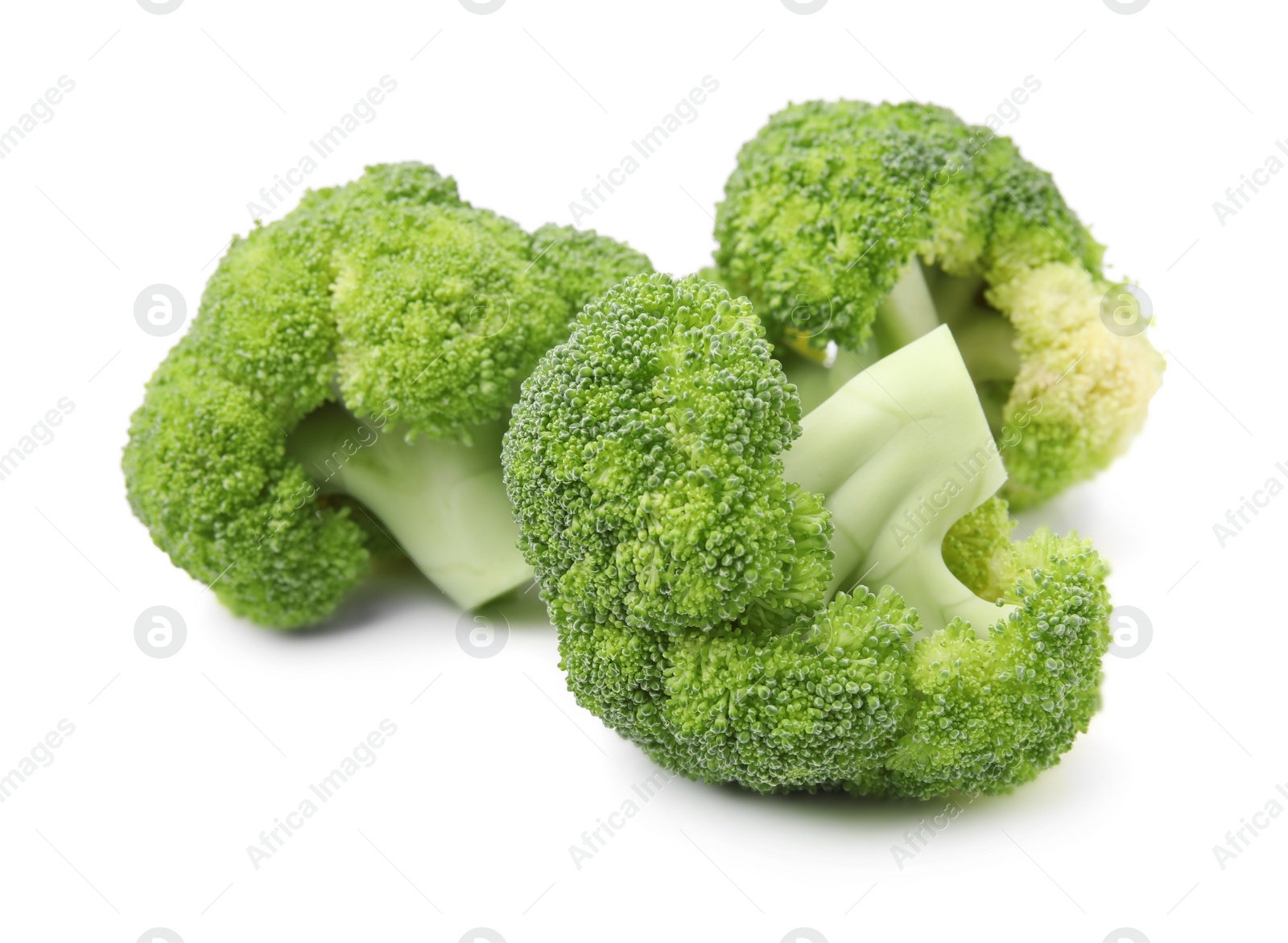 Photo of Fresh raw green broccoli isolated on white