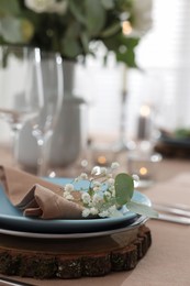 Festive table setting with beautiful tableware and decor, closeup