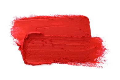 Smears of red lipstick on white background