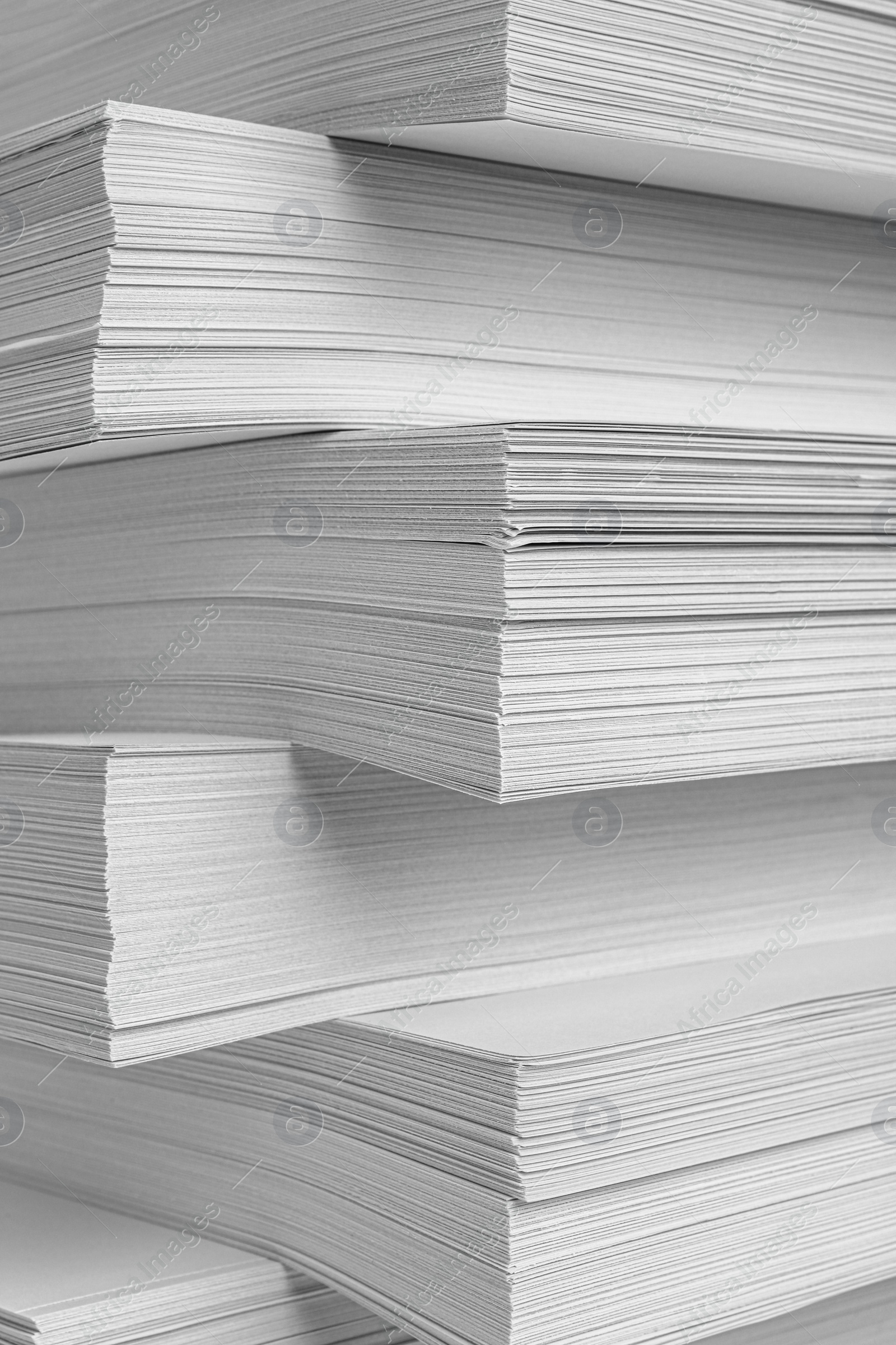 Photo of Stack of white paper sheets, closeup view