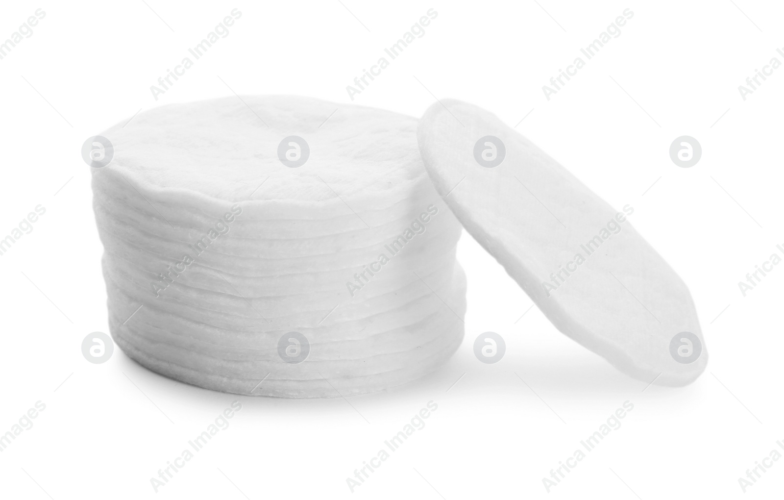 Photo of Stack of cotton pads isolated on white