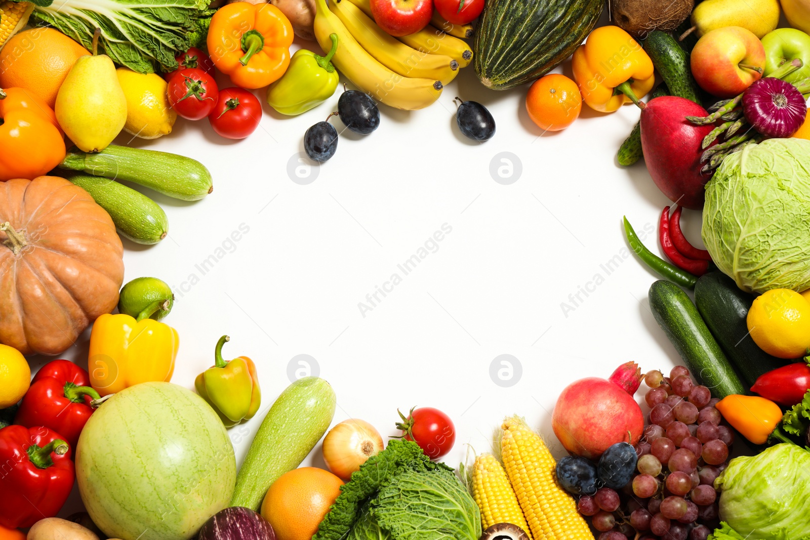 Photo of Frame of assorted fresh organic fruits and vegetables on white background, top view. Space for text