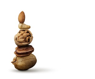 Stack of different nuts on white background