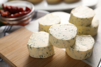 Photo of Tasty butter with dill on table, closeup