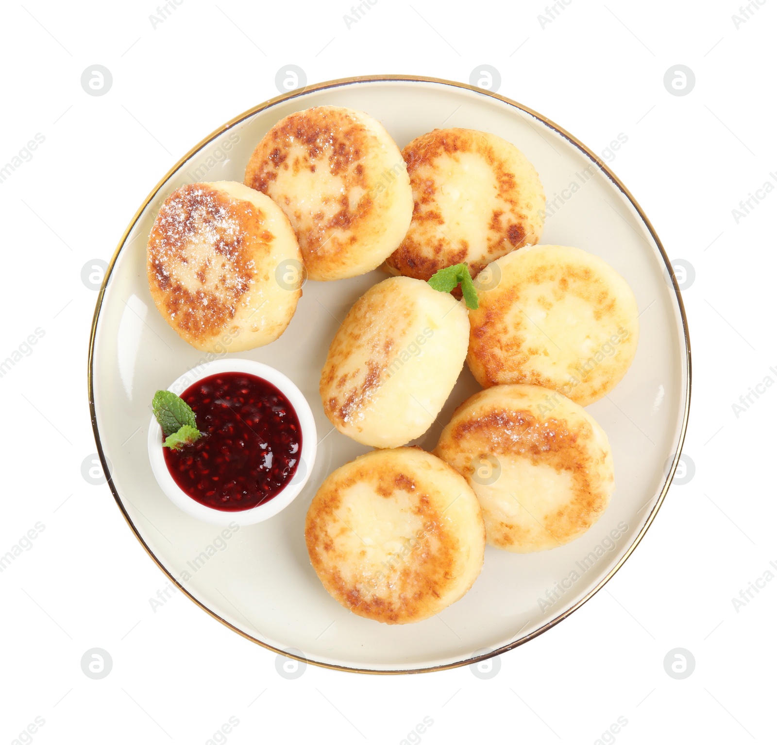 Photo of Delicious cottage cheese pancakes with jam and icing sugar isolated on white, top view