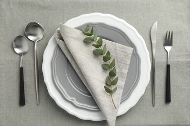 Photo of Stylish setting with cutlery and plates on table, flat lay