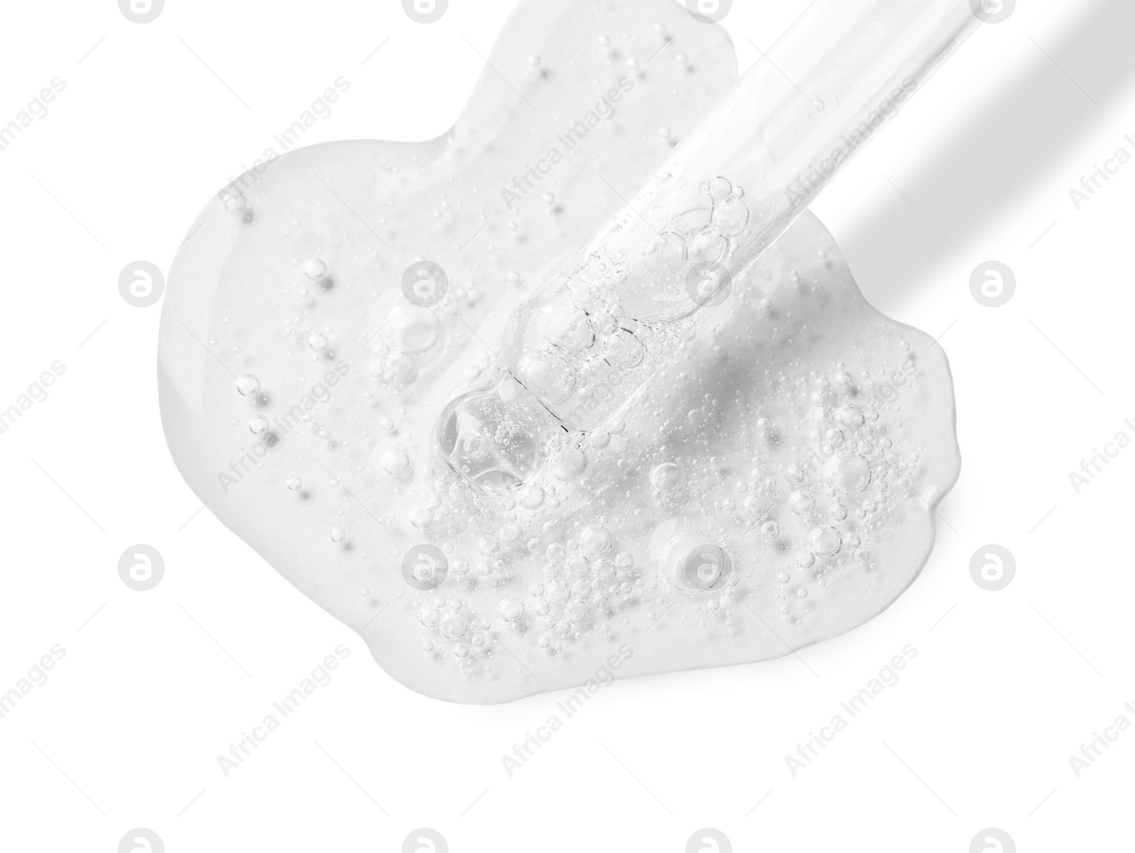 Image of Dropper with serum on white background, top view. Skin care product